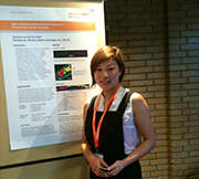 Application Scientist Katherine Lau with presentation poster