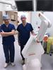 Mr Martin Tisdall and Kristian Aquilina with the neuromate robot